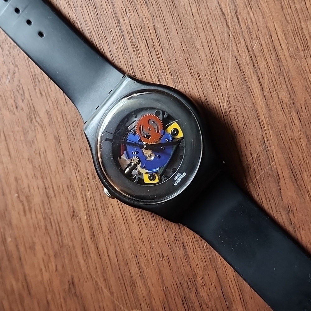 Swatch black lacquered watch